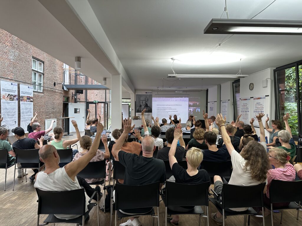 Abstimmung bei der Gründung der Dachgenossenschaft Wilhelmsburg